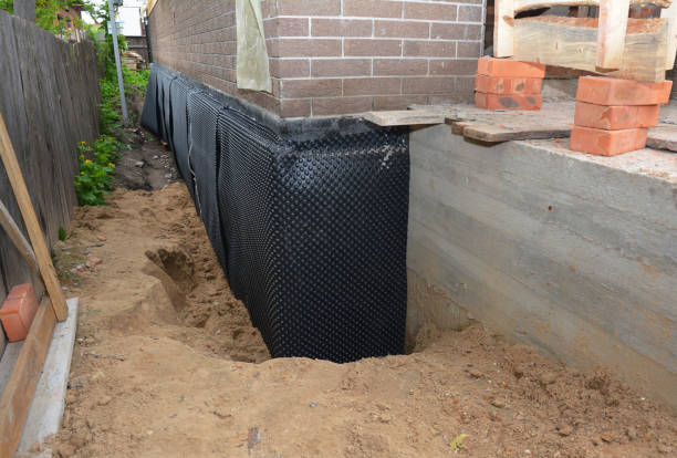 Happy homeowners after waterproofing job in Ringoes